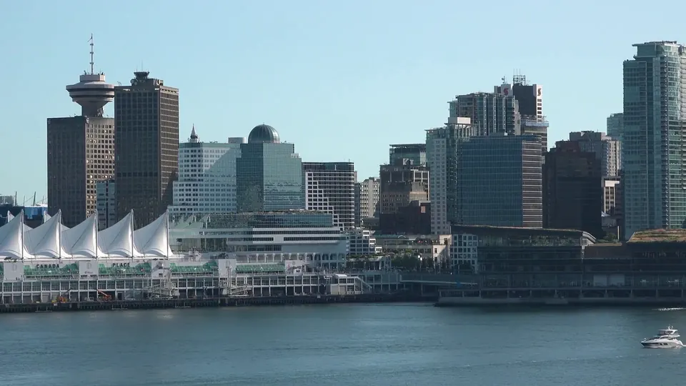 Downtown Vancouver and the sails of Canada Place seen across the harbour